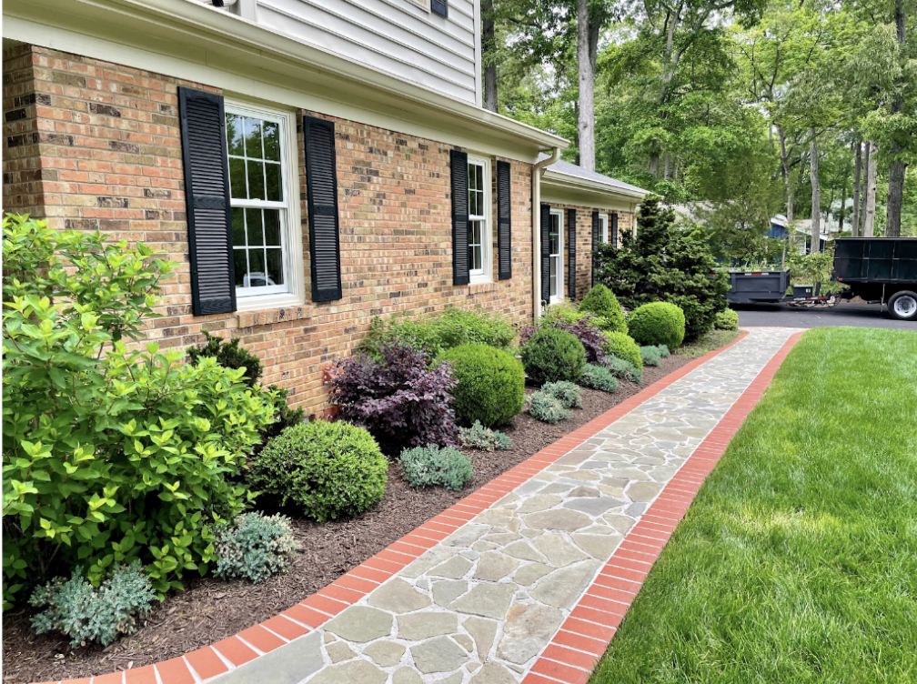 after shot of a weeded landscape bed 